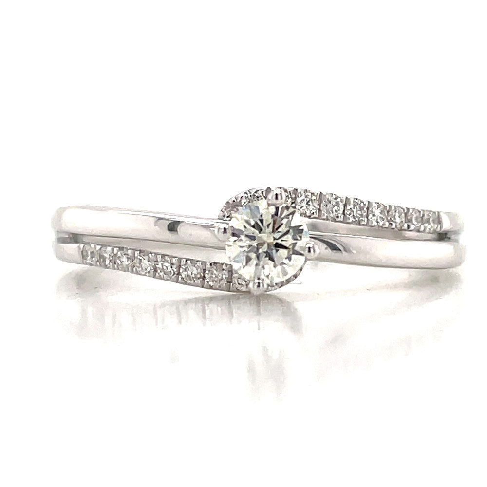 9K White Gold Diamond Solitaire Crossover Ring