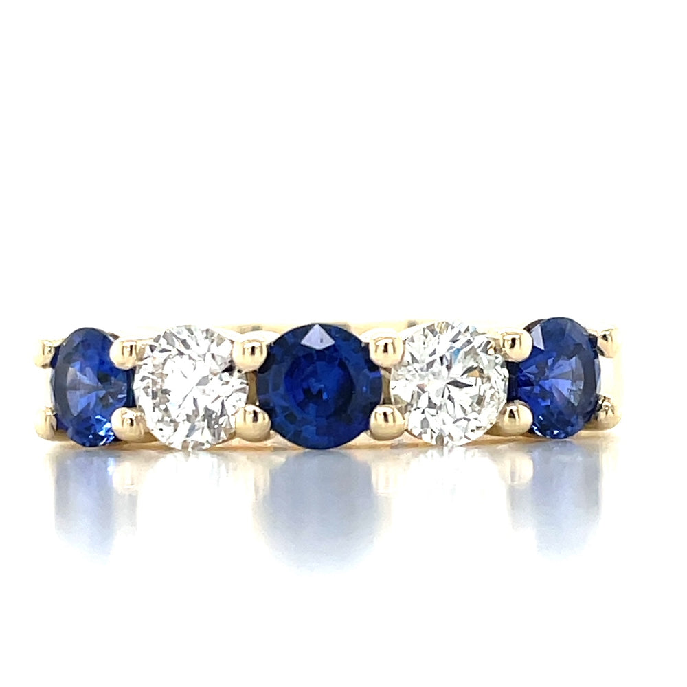 Diamond and sapphire band ring