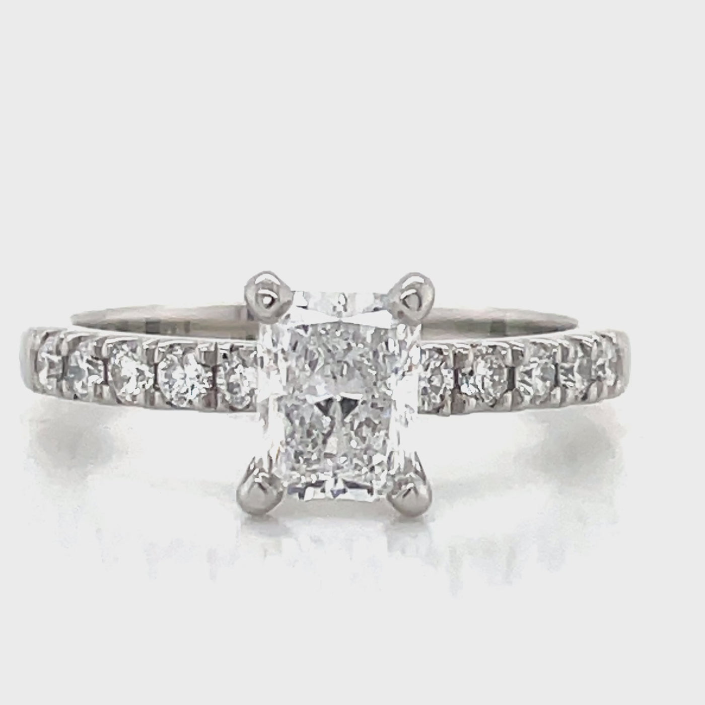 "Paula" Platinum Radiant & Round Diamonds Ring