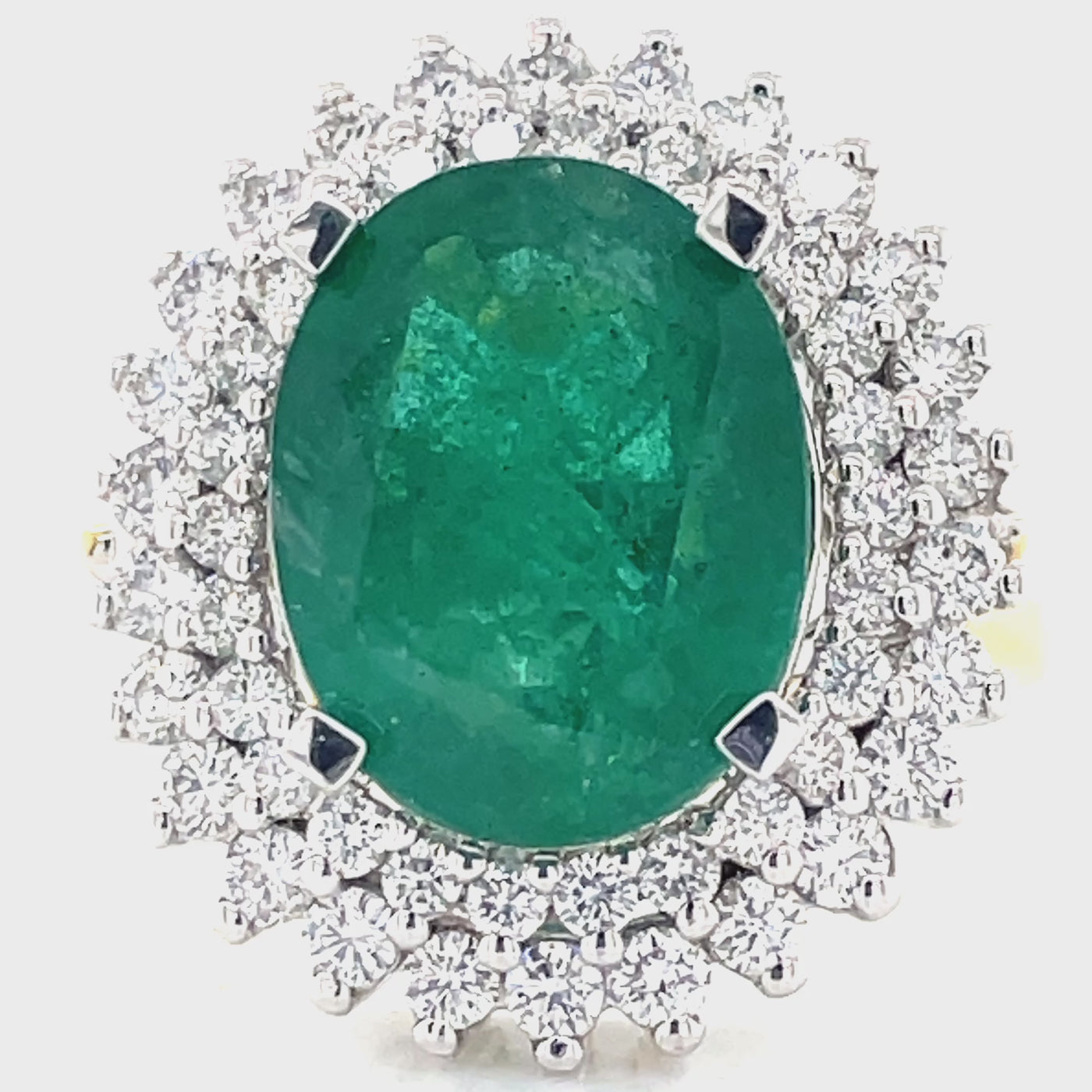 18k B/Tne 6.65ct Oval Emerald & 1.24ct Diamonds Cluster Ring